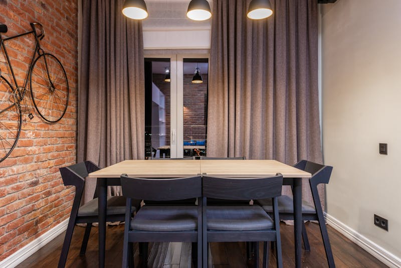 Pequod's Pizza restaurant interior with warm lighting and cozy atmosphere